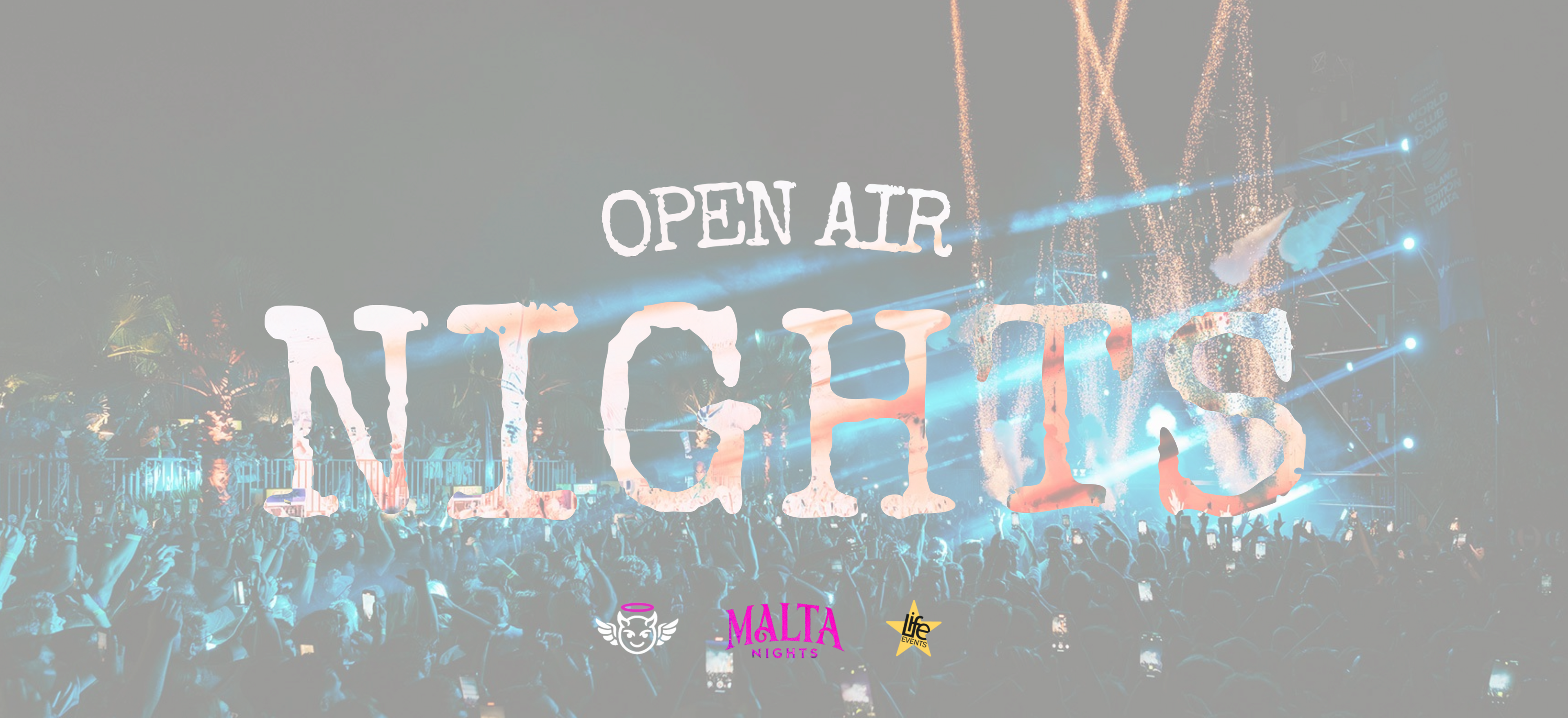 Open air party in Malta with large crowd, lights and outdoor festival atmosphere